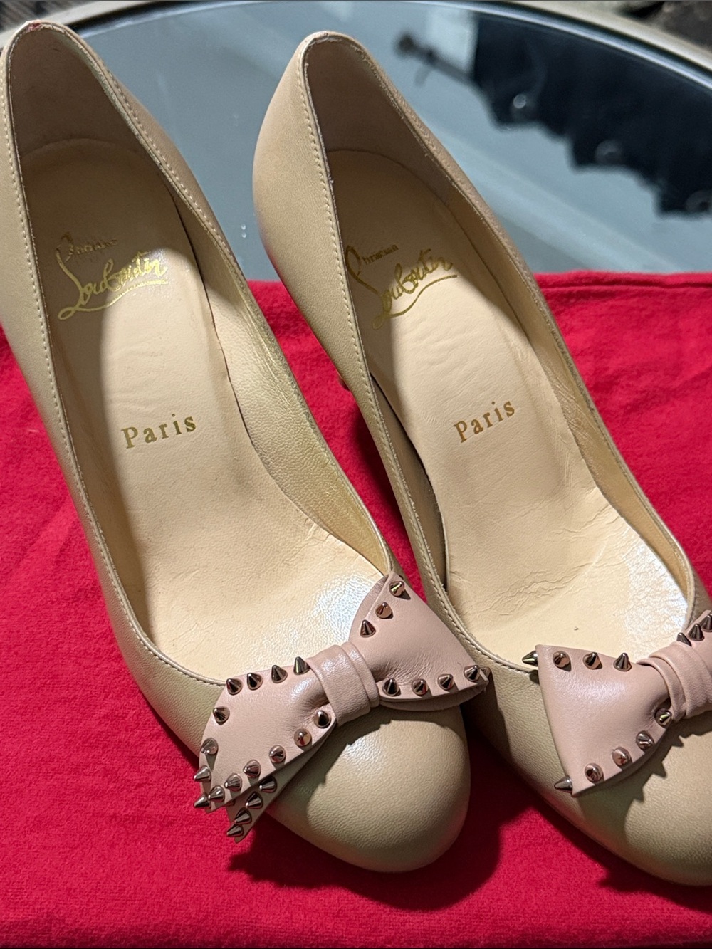 Christian Louboutin Nude Leather Pumps with Blush Studded Bow